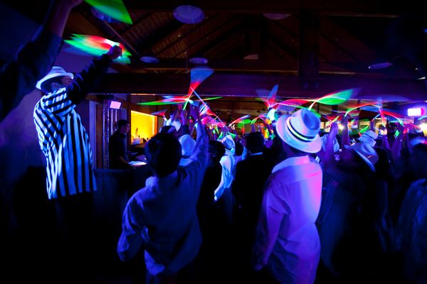 Glow party with neon decorations under blacklight