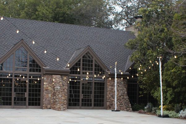Courtyard party with overhead market lights
