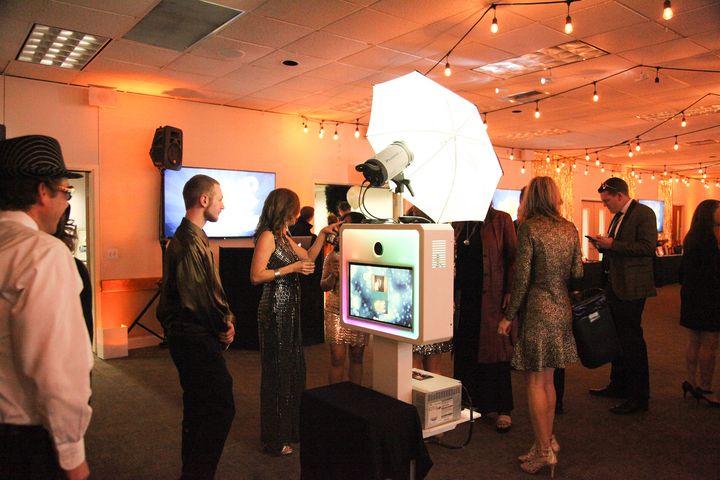 Open style photo booth setup at a corporate event