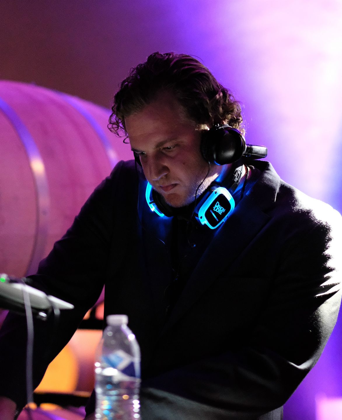 Denon & Doyle DJ setup beside an outdoor wedding reception