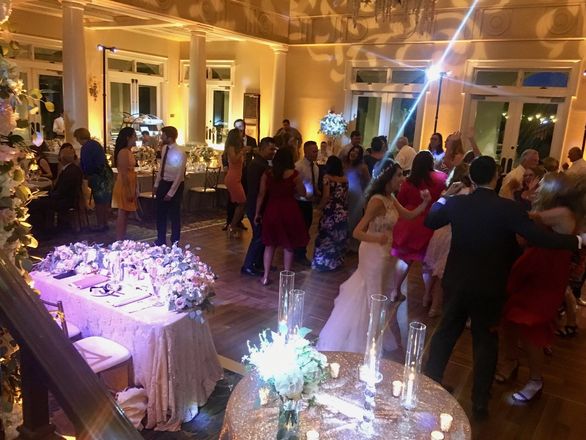 Pinspot lighting across a wedding reception