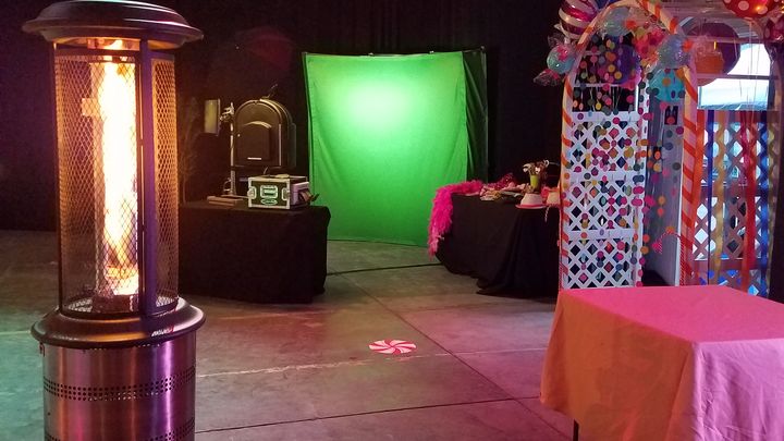 Green screen photo booth setup at an event