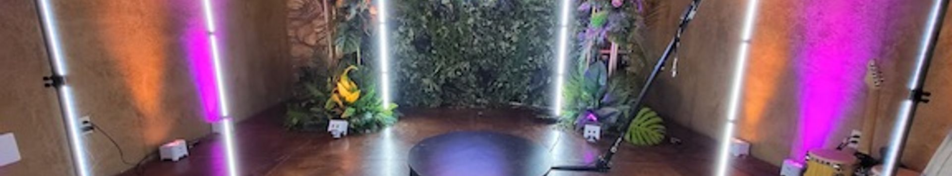 Guests posing on a 360 photo booth platform