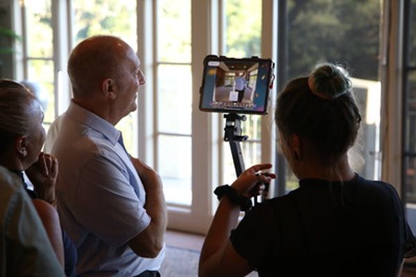 Guests on the 360 photo booth platform