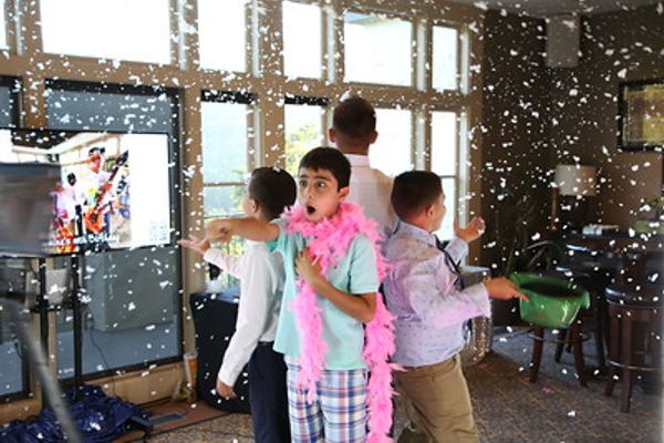 Event guests creating a 360 booth clip