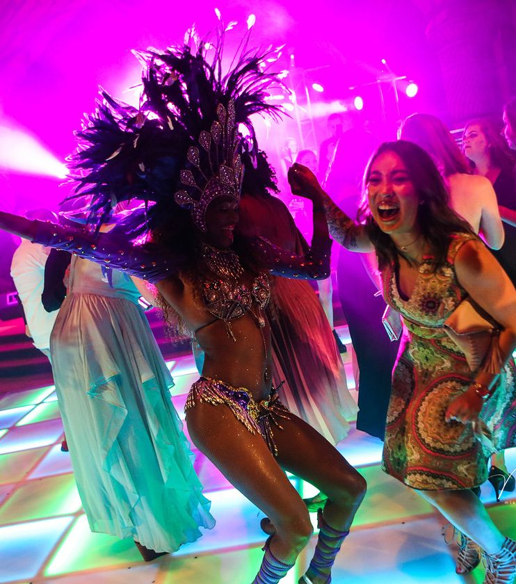 Guests dancing on an interactive light-up dance floor