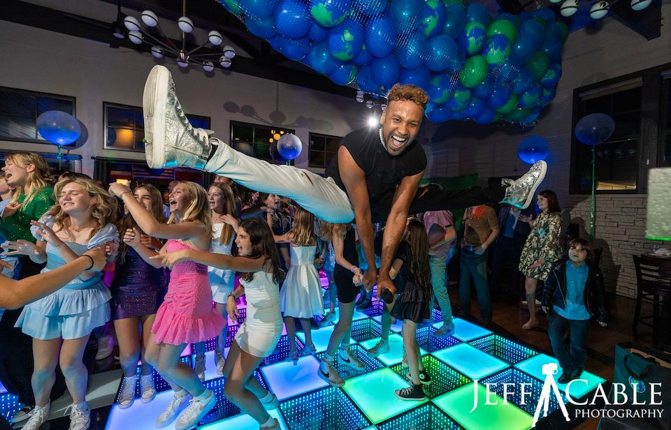 Kieu performing at a Denon & Doyle event