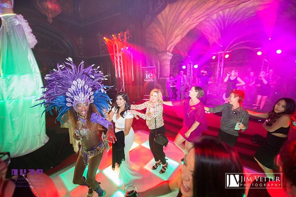 Wedding guests on an illuminated dance floor