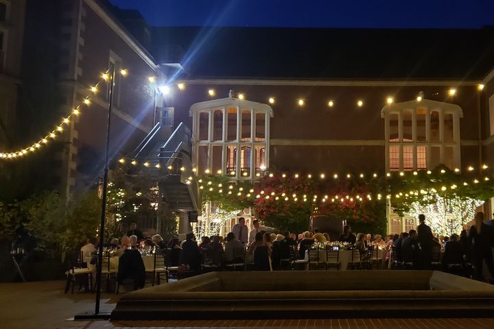 Outdoor wedding or event space with warm lighting