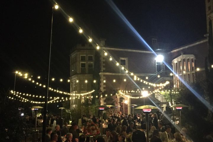 Market lighting for an outdoor branded corporate event