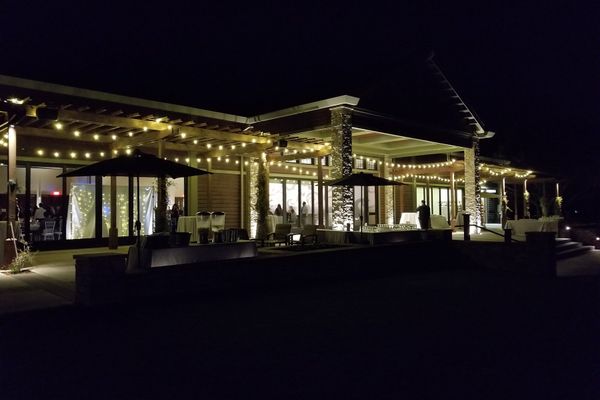 Patio reception with bistro lights