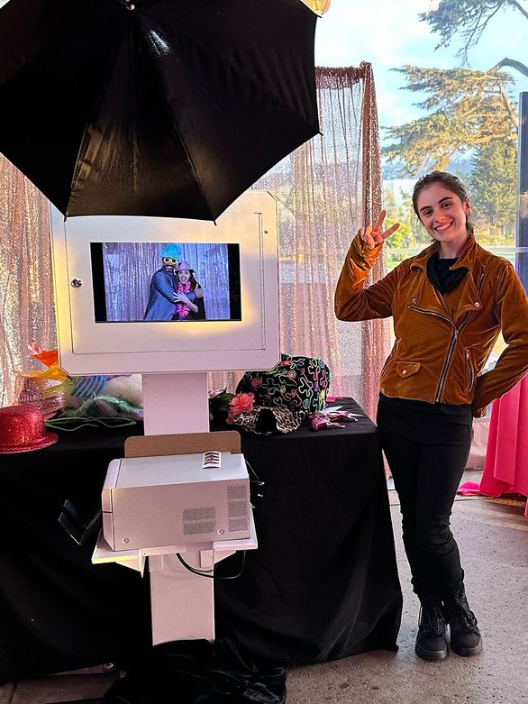 Branded photo booth backdrop at a corporate event