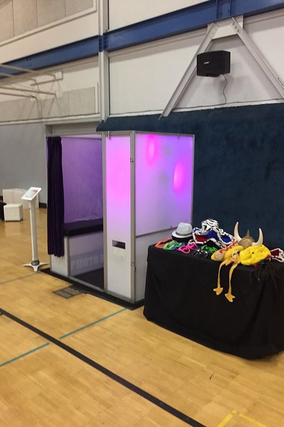 Classic photo booth options display with props and print examples